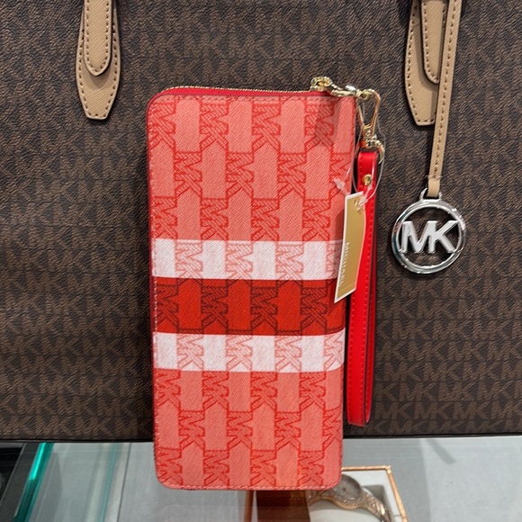 MICHAEL KORS Leather Continental Phone Holder Wristlet Wallet 
Dark Sungria
NWT